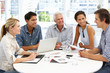 Photo: Mixed group in business meeting Mixed group in business meeting