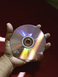 Computer DVD, in human hand