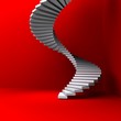 lighted stairs in a dark red room
