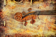 Violino e libro di musica, con testura, fondo Violino e libro di musica, con testura, fondo