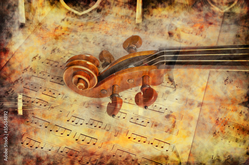 Photo: Violino e libro di musica, con testura, fondo Violino e libro di musica, con testura, fondo
