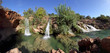 small waterfall in tavira - algarve, portugal