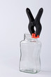 A jar and a pair of pliers