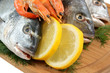Seafood with lemon and dill background