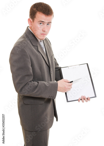 Photo: Businessman shows a blank page on a white background. Businessman shows a blank page on a white background.