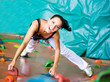 women climbing on a wall