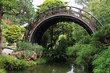Arch bridge in an Japanese garden Arch bridge in an Japanese garden