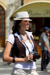 Pretty tourist girl with camera