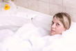 Woman Relaxing in the Tub Woman Relaxing in the Tub