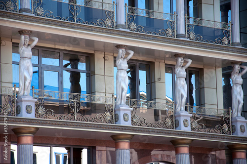 Photo: Caryatids on the facade of a modern building Caryatids on the facade of a modern building