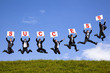 happy businessman holding success text  and jumping