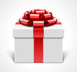 Gift box with red bow isolated on white Gift box with red bow isolated on white