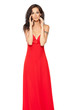 Beautiful female fashion model posing in long red dress