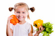 Little girl with the vegetables