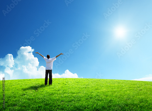 Photo: happy young man on green field happy young man on green field