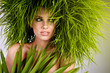 Photo: Young woman and abstract green hair Young woman and abstract green hair
