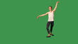 Full length of graceful young man performing ballet