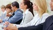 Portrait of confident business people attending seminar together