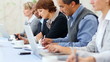 Portrait of business people hand working during seminar
