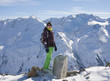 woman in ski cloths and the snowy mountains, austria