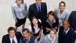 Multi racial business people smiling together showing unity