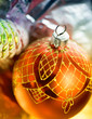 Christmas-tree decorations. One red ball is in focus. Christmas-tree decorations. One red ball is in focus.