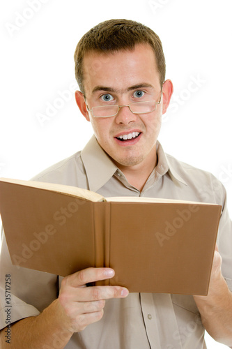Photo: The man in glasses with a book. The man in glasses with a book.