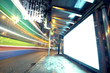 white display advertising with traffic at night white display advertising with traffic at night