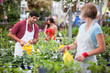 People working at greenhouse People working at greenhouse