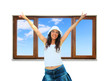 Foto: Happy girl in front of the window Happy girl in front of the window