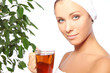 Photo: Young woman with cup of hot tea Young woman with cup of hot tea