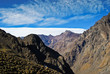 Hikers look small in the Andes