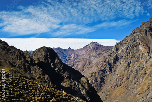 Photo: Hikers look small in the Andes Hikers look small in the Andes