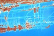 blue background of rusty metal