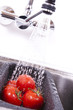 Delicious ripe tomatoes are washed off. Delicious ripe tomatoes are washed off.