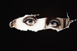 Women's blue eyes spying