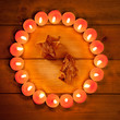 chirstmas candles circle over wood and symbol chirstmas candles circle over wood and symbol