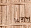 Photo en ligne au meilleur prix Safety fragile icon on wooden box with space