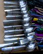 Stainless steel spoons on display at an open air market in India