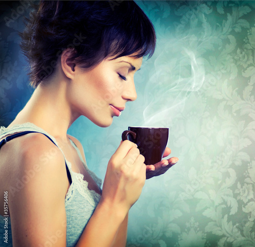Photo: Beautiful Girl With Cup of Coffee Beautiful Girl With Cup of Coffee