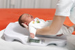 baby boy on weight scale