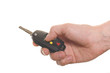men's hand with a car's key isolated over white