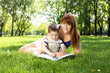 Mother with little son in the park