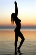 Silhouette of a young woman