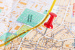 Photo: Red pushpin on a map Red pushpin on a map