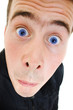 Funny man looks up on a white background.
