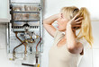 The woman is upset by that the gas water heater The woman is upset by that the gas water heater