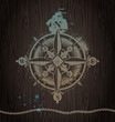 Vector compass rose painting on a wooden wall