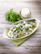 ravioli stuffed with ricotta and basil garnish with cream and as