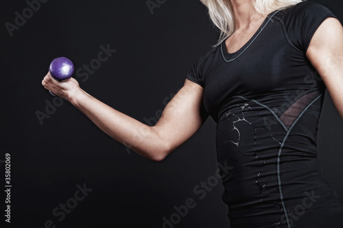 Photo: Female with dumbbell Female with dumbbell